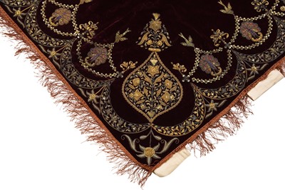 Lot 257 - A PLUM VELVET COVER WITH PEACOCKS