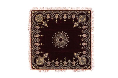 Lot 257 - A PLUM VELVET COVER WITH PEACOCKS