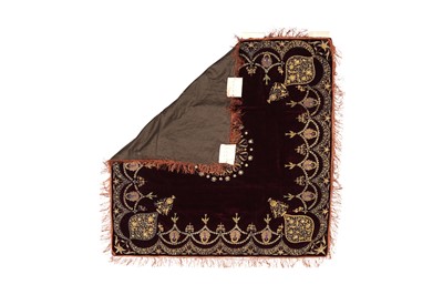 Lot 257 - A PLUM VELVET COVER WITH PEACOCKS