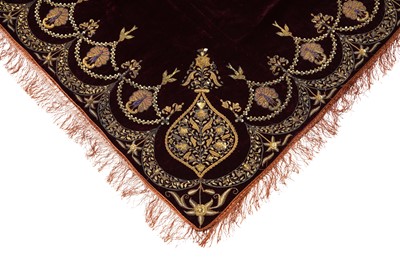 Lot 257 - A PLUM VELVET COVER WITH PEACOCKS
