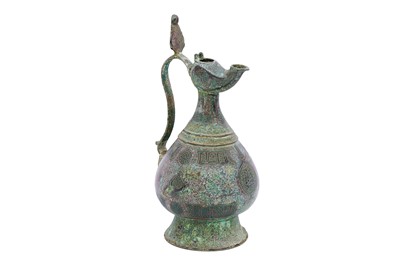 Lot 347 - AN ENGRAVED BRONZE EWER