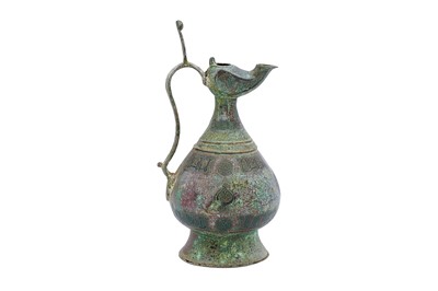 Lot 347 - AN ENGRAVED BRONZE EWER