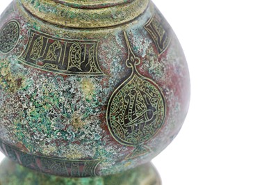 Lot 347 - AN ENGRAVED BRONZE EWER