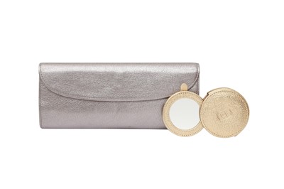 Lot 127 - Harry Winston Metallic Jewellery Roll and Mirror