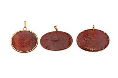 Lot 85 - THREE CARNELIAN PENDANTS