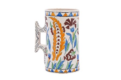 Lot 407 - AN IZNIK-STYLE ITALIAN MAJOLICA POTTERY TANKARD