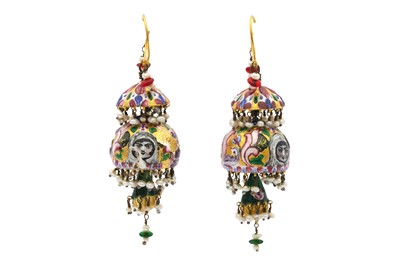 Lot 45 - A PAIR OF QAJAR POLYCHROME-PAINTED ENAMELLED EARRINGS