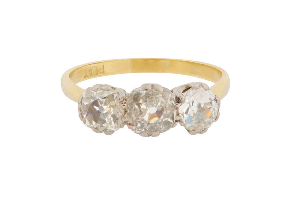 Lot 4 - A DIAMOND THREE-STONE RING