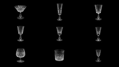 Lot 185 - A SET OF WATERFORD CRYSTAL DRINKING GLASSES IN A DEVIATION OF THE LISMORE PATTERN