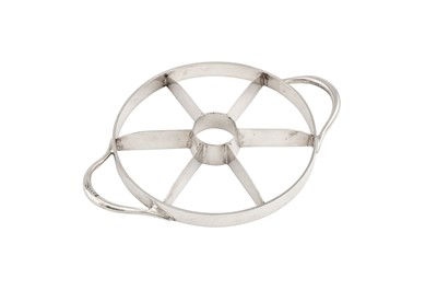 Lot 56 - A George V sterling silver twin handled apple corer, Birmingham 1919 by Hukin and Heath, overstriking another