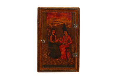 Lot 35 - A LACQUERED PAPIER-MÂCHÉ MIRROR CASE WITH QAJAR INTERIOR SCENES