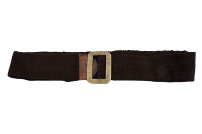 Lot 339 - A BROWN-DYED COARSE WOOL BELT WITH AN ENGRAVED WHITE METAL BELT BUCKLE