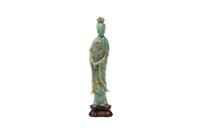 Lot 185 - A CHINESE JADE CARVING OF GUANYIN