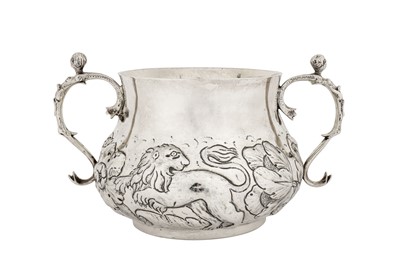 Lot 497 - A large Charles II sterling silver twin handled porringer, London 1662 possibly by John Burges (free. 1624, d. 1662)
