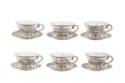 Lot 165 - A set of six mid-20th century Vietnamese silver tea cups and saucers, Hanoi circa 1960
