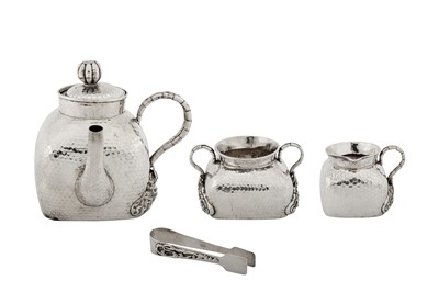 Lot 161 - A good cased early 20th century Chinese export silver three-piece tea service, Jiujiang circa 1910 by Tu Mao Xing