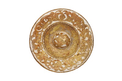 Lot 422 - A MOULDED COPPER LUSTRE-PAINTED HISPANO-MORESQUE POTTERY CHARGER