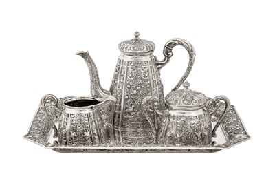 Lot 220 - A late 19th / early 20th century German 800 standard bachelor three-piece coffee set on tray, circa 1900