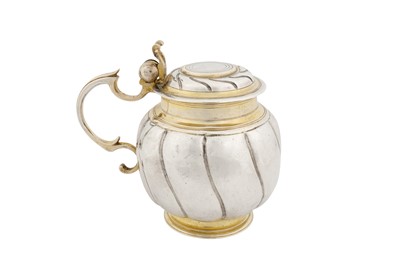 Lot 234 - A mid-17th century German parcel gilt silver tankard, Augsburg 1655 by Hironymus Wolfgang Kern (meister 1642, d. 1660)