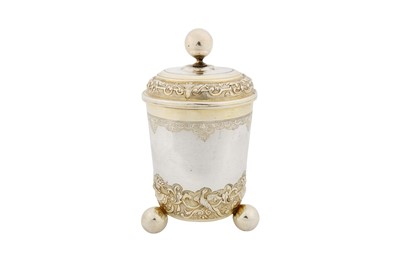 Lot 231 - An early 18th century German parcel gilt silver covered beaker, Augsburg 1719-20 by Johann Fassnacht (b. 1654, meister 1686, d. 1726)