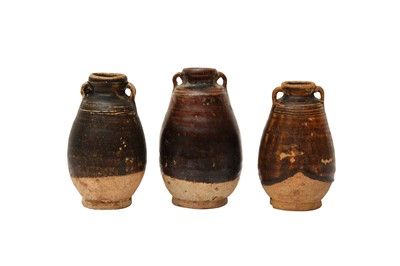Lot 678 - THREE THAI SAWANKHALOK BROWN-GLAZED JARS