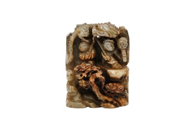 Lot 133 - A CHINESE GREY JADE CARVING OF BOYS ON A MOUNTAIN