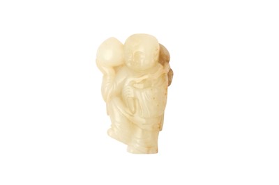 Lot 132 - A CHINESE PALE-CELADON JADE 'BOY AND PEACH' CARVING