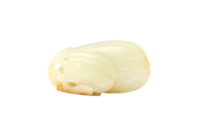 Lot 130 - A CHINESE CELADON AND RUSSET JADE 'MELON AND BUTTERFLY' CARVING