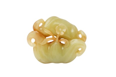 Lot 129 - A CHINESE GREEN JADE 'WATER CALTROP' CARVING