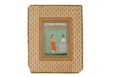 Lot 143 - A FEMALE DEVOTEE MAKING AN OFFERING
