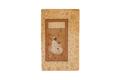 Lot 174 - A SEATED PORTRAIT OF A YOUNG MALIK AMBAR (1548 - 1626) SMOKING A HUQQA