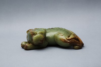 Lot 127 - A LARGE CHINESE GREEN AND RUSSET JADE MYTHICAL BEAST