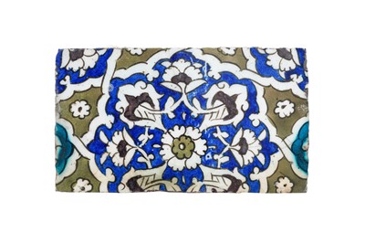 Lot 396 - A FRAGMENT OF AN OTTOMAN DAMASCUS POTTERY TILE