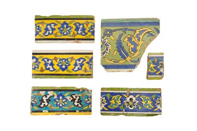 Lot 287 - SIX FRAGMENTS OF SAFAVID CUERDA SECA POTTERY BORDER TILES
