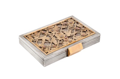 Lot 11 - A mid-20th century French silver, gold, and gem set compact / minaudiere, Paris circa 1940 by Helluin-Mattlinger for Boucheron