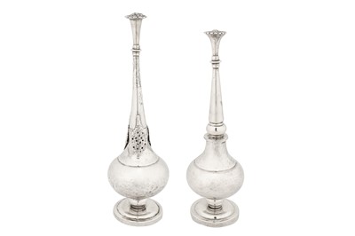 Lot 180 - Two early 20th century Iraqi unmarked silver rose water sprinklers, Baghdad circa 1920