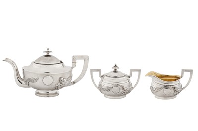 Lot 154 - A cased early 20th century Chinese export silver three-piece tea service, Shanghai circa 1920 by Lun retailed by Zee Sung