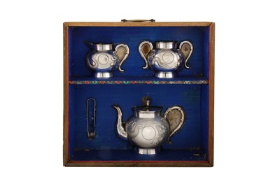 Lot 151 - A cased late 19th / early 20th century Chinese export silver three-piece tea service, Shanghai circa 1900 by Shang retailed by Cum Shing