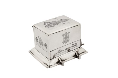 Lot 184 - An early 20th century Iraqi silver and niello cigarette dispenser, Omara circa 1930 signed Shoodod
