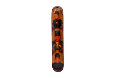 Lot 335 - A QAJAR LACQUERED PAPIER-MÂCHÉ PEN CASE (QALAMDAN) WITH THREE OFFICIAL PORTRAITS OF QAJAR NOBLEMEN