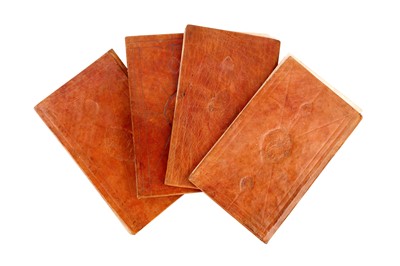 Lot 372 - FOUR QURANIC JUZ’ MANUSCRIPTS IN TOOLED LEATHER BINDINGS