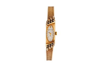 Lot 77 - BULOVA. AN OBLIQUE LADIES WRISTWATCH