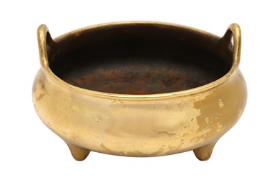 Lot 503 - A CHINESE POLISHED BRONZE TRIPOD CENSER