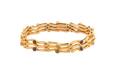 Lot 24 - A PERIDOT AND AMETHYST BRACELET