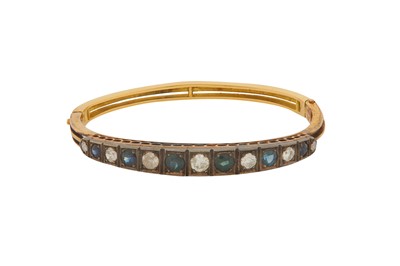 Lot 10 - A SAPPHIRE AND DIAMOND BANGLE
