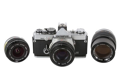 Lot 359 - An Olympus OM2n outfit.