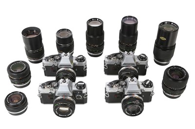 Lot 371 - Four Olympus OM10 outfits.
