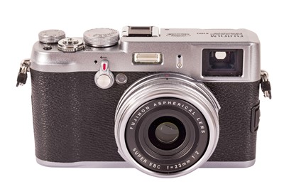 Lot 350 - A Fuji X100 camera and accessories.
