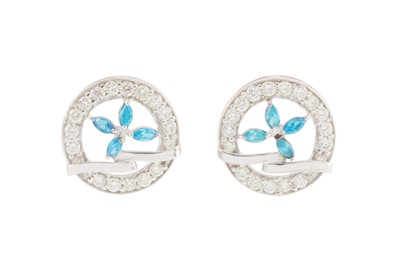 Lot 264 - A PAIR OF CIRCULAR DIAMOND AND BLUE TOPAZ EARRINGS