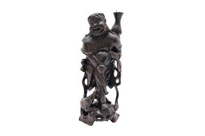 Lot 246 - A CHINESE CARVED WOOD FIGURE OF LIU HAICHAN